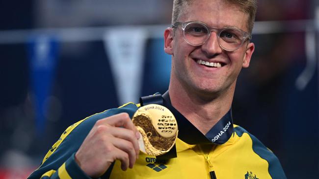 Australia's Sam Williamson poses with his gold medal Photo by Oli SCARFF / AFP)