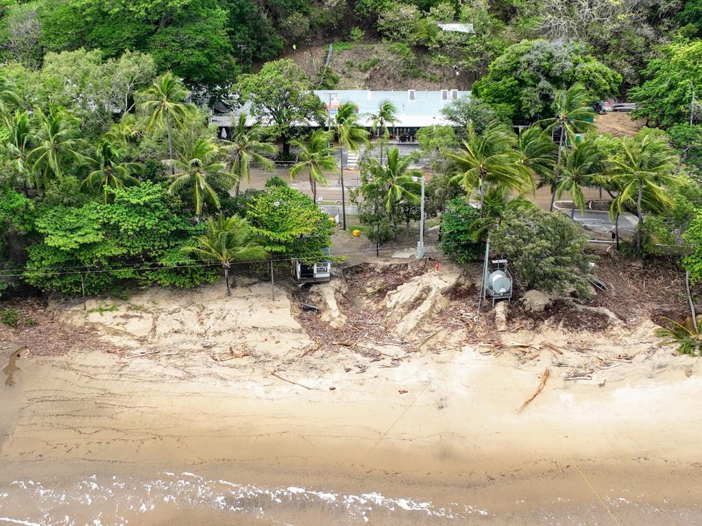 The Ellis Beach Bar and Grill has been smashed by landslides caused by flooding rain after ex Tropical Cyclone Jasper crossed the Far North Queensland coast. The building was filled with mud, rocks, and trees, and will take weeks to clean up. Picture: Brendan Radke