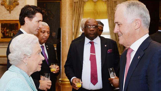 Queen Elizabeth II talks to then Prime Minister Malcolm Turnbull during a Heads of Government reception at the San Anton Palace in 2015.