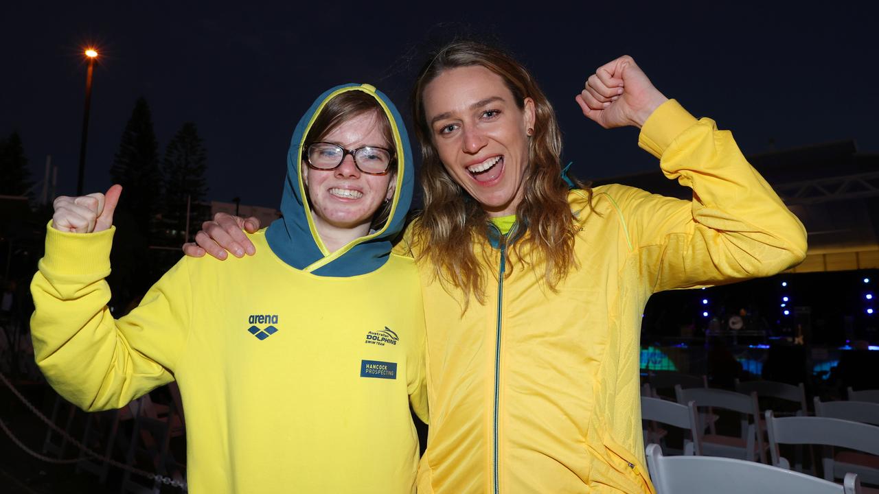 Sarah Wallace 18, and London Olympian Tessa Wallace 27, celebrate at the Olympic Live site at Kings Beach. Picture: Lachie Millard