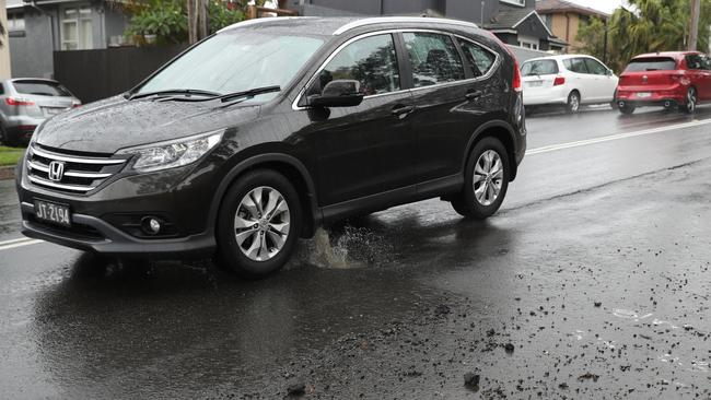 A large section of busy Beacon Hill Rd, Beacon Hill, was badly affected by potholes after a bout of bad weather. Northern Beaches Council fixed 3,346 potholes on local roads in a seven month period up to January this year. Picture John Grainger