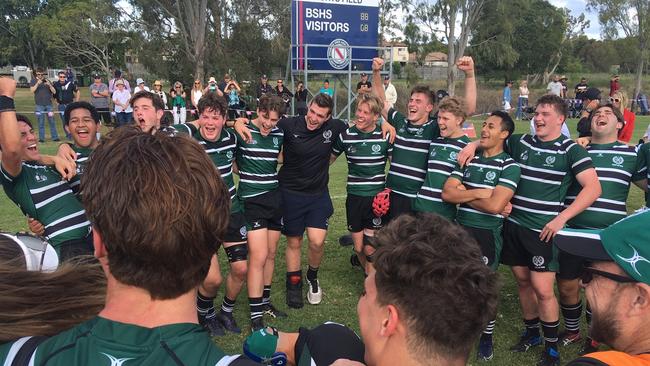 Brisbane Boys’ College players celebrate the premiership.