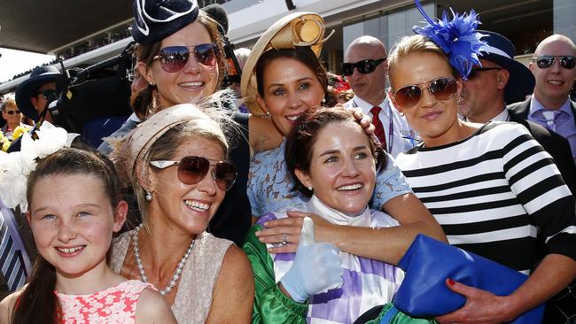 Payne celebrates with her sisters. Picture: Colleen Petch