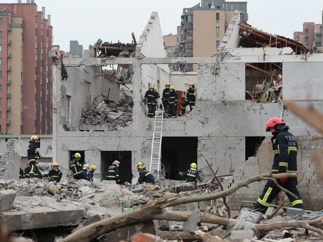 Rescue workers are seen at the site of an explosion in Ningbo. Picture: AFP