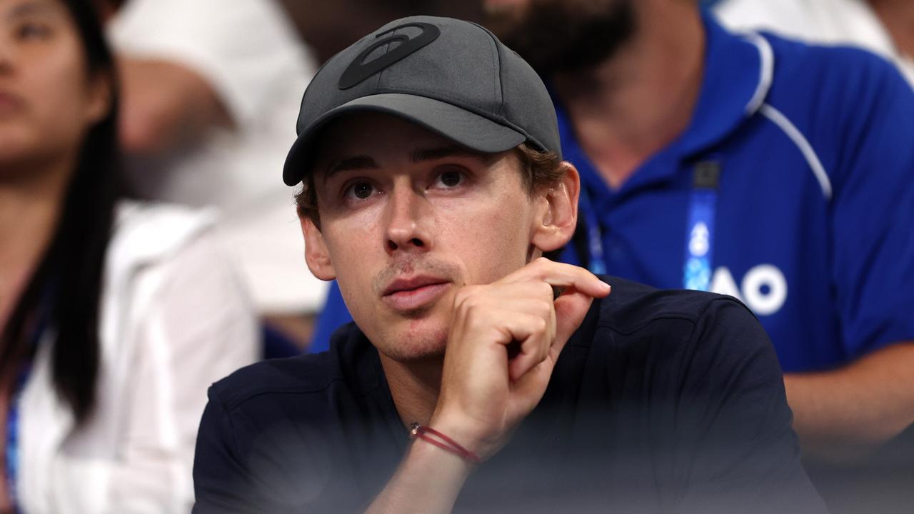 Alex de Minaur watches Katie Boulter’s first round match after winning his own. (Photo by Graham Denholm/Getty Images)