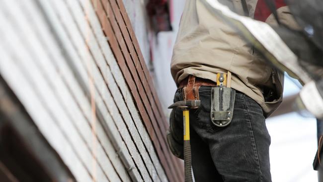 The unlicensed tradie was charged with 37 offences (file photo).