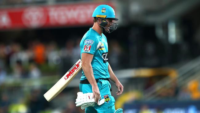 A dejected AB de Villiers walks from the Gabba after being clean-bowled for two against the Renegades on Sunday night. Picture: Getty Images