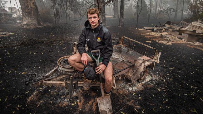 Mitch McLean, 16, was still putting out spot fires on his neighbour’s property after the Corryong fire hit. Picture: Jason Edwards