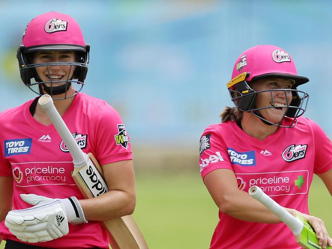 PERTH, AUSTRALIA - NOVEMBER 03:   Ellyse Perry and Alyssa Healy of the Sixers leave the field at the end of innings during the Women's Big Bash League match between the Sydney Sixers and the Melbourne Stars at WACA on November 03, 2019 in Perth, Australia. (Photo by Will Russell/Getty Images)