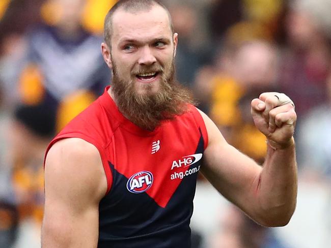 MELBOURNE, AUSTRALIA - AUGUST 06: Max Gawn of the Demons celebrates after kicking a goal during the round 20 AFL match between the Melbourne Demons and the Hawthorn Hawks at Melbourne Cricket Ground on August 6, 2016 in Melbourne, Australia. (Photo by Scott Barbour/Getty Images)