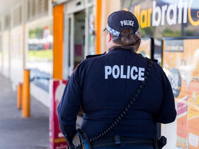 Unidentified point of sale intervention officer in Alice Spirngs. October 31 2017 *no byline*