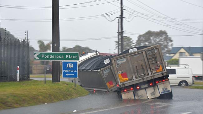 A truck stuck on a collapsed corner of road at Dromana. Picture: Adam Richmond