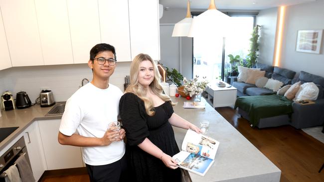 L to R, Radiant Thomas and partner Phoebe Burrows, Realestate, first home buyers saved for years to buy a property, Cannon Hill, on Thursday 24th August 2023 - Photo Steve Pohlner