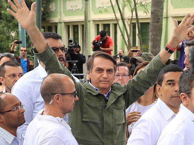 RIO DE JANEIRO, BRAZIL - OCTOBER 28: Jair Bolsonaro, far-right lawmaker and presidential candidate of the Social Liberal Party (PSL), gestures after casting his vote during general elections on October 28, 2018 in Rio de Janeiro, Brazil.  (Photo by Buda Mendes/Getty Images)