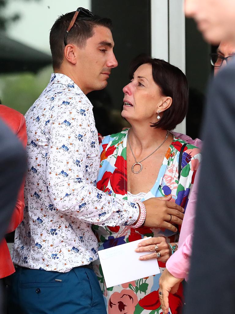 Hannah Clarke’s brother Nathaniel and mother Suzanne comforts each other. Picture: Jono Searle/AAP