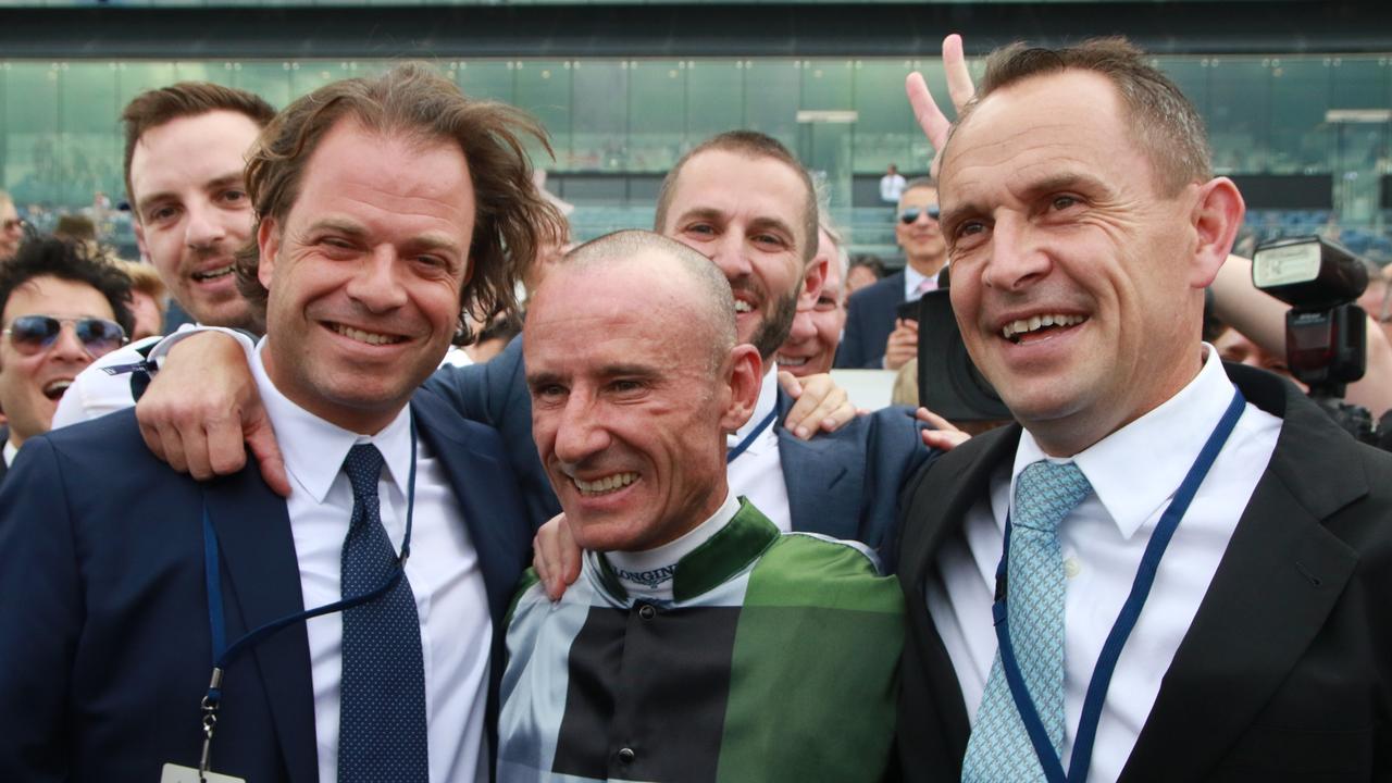 Coolmore Stud's Tom Magnier (left), jockey Glen Boss and trainer Chris Waller (right) celebrate the win of Yes Yes Yes in the 2019 The TAB Everest. Picture: Grant Guy