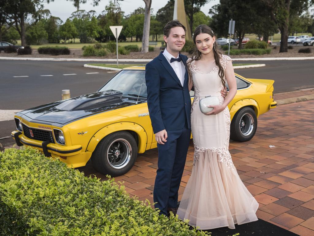 Jaden McIntosh partners Zoey Tanzer to her Wilsonton State High School formal arrivals at USQ, Wednesday, November 18, 2020. Picture: Kevin Farmer