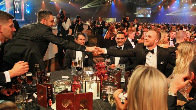 Tom Mitchell is congratulated after his Brownlow win. Picture: Mark Stewart