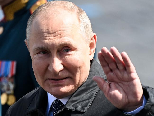 Vladimir Putin, before being run through the AI app NewProfilePic, as he leaves Red Square after the Victory Day military parade in central Moscow. Picture: AFP.