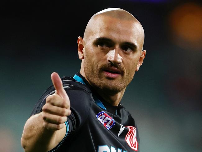 ADELAIDE, AUSTRALIA - APRIL 26: Sam Powell-Pepper of the Power gives the thumbs up to fans before the game during the 2024 AFL Round 07 match between the Port Adelaide Power and the St Kilda Saints at Adelaide Oval on April 26, 2024 in Adelaide, Australia. (Photo by Sarah Reed/AFL Photos via Getty Images)