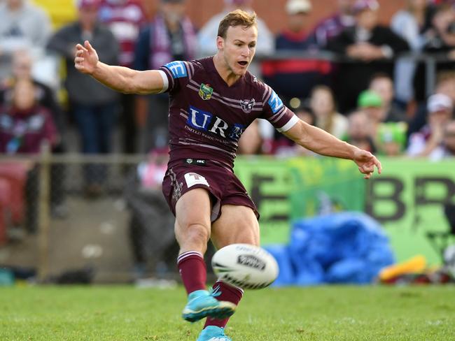 Daly Cherry-Evans kicks a field goal in extra time during the round 13 against the Canberra Raiders.