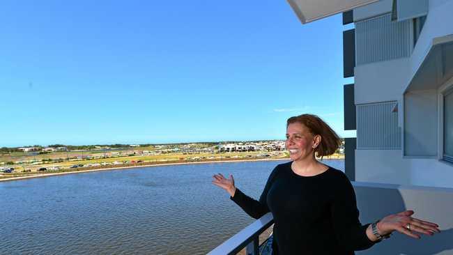 OVER THE MOON: Amira Mahboub bought this unit in Kawana and when she saw it for the first time today she fell in love with it. Picture: John McCutcheon