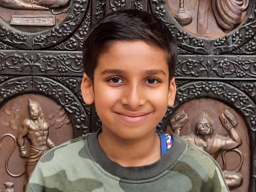 Kids News 2023: Adit Garg, 10, a year 4 student at Epping Public School, has won the Primary News Story (Video) category of the inaugural Kids News Junior Journalist competition with his dynamic report of the Granny Smith Festival. The roving reporter is pictured at TBC. Picture: supplied