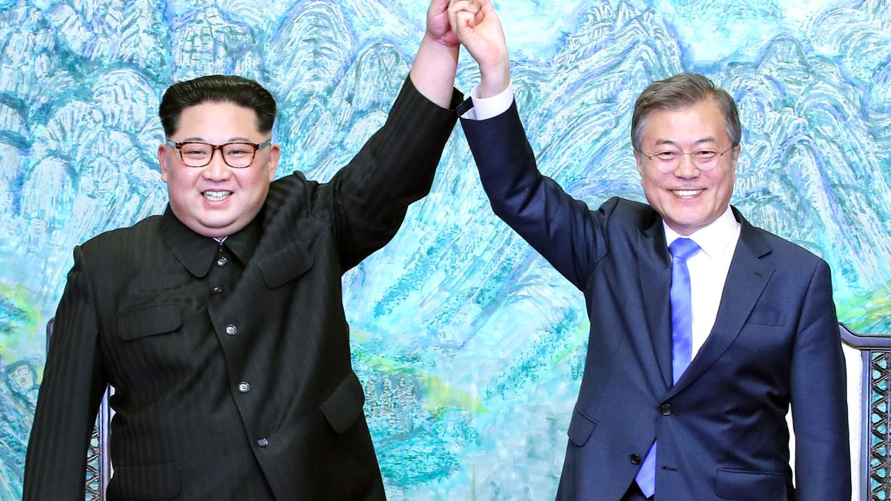 The two Korean leaders in more optimistic times. Picture: Getty Images