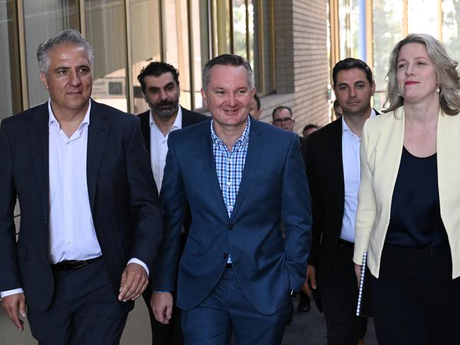 Fairfield Mayor Frank Carbone (left) pictured with Home Affairs Minister Clare O'Neil and Energy Chris Bowen.