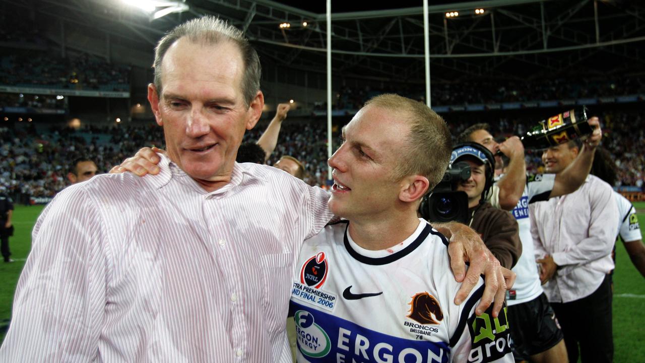 Wayne Bennett celebrates with captain Darren Lockyer after the 2006 Grand Final.