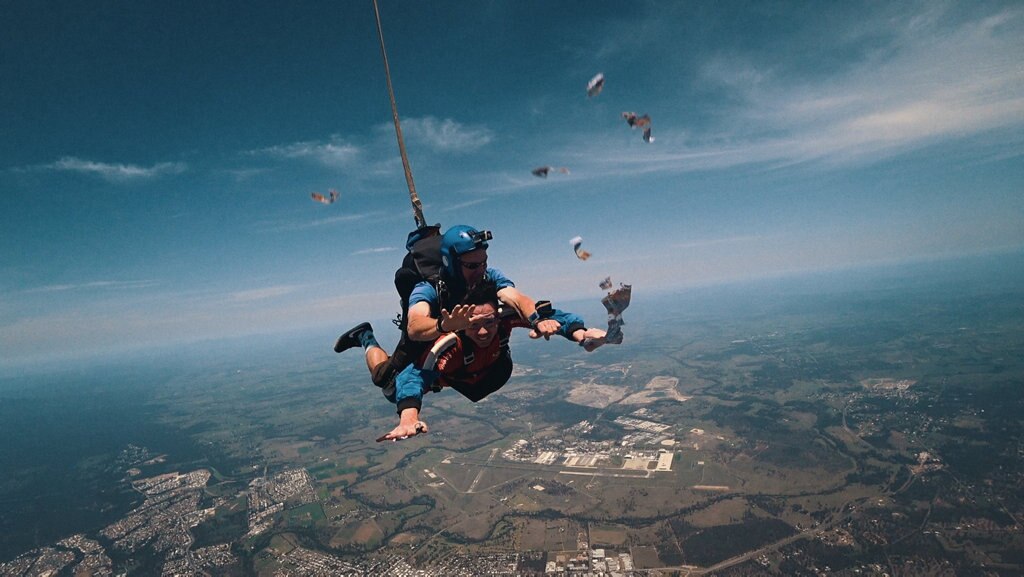 Brisbane radio host Stav Davidson dropped $10,000 in $5 notes during a skydive. Picture: Contributed