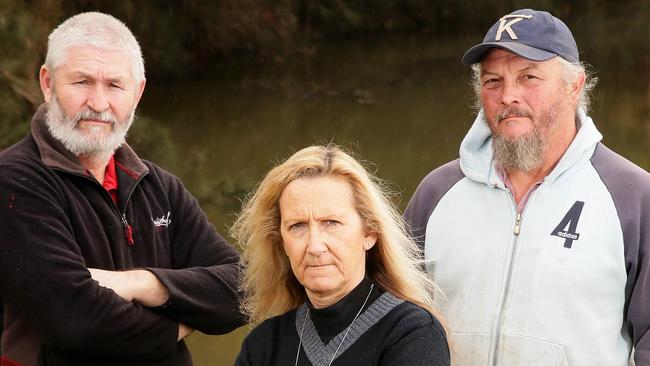 Riverstone residents John Huntington, Diane Baldwin and Tony Olsen are concerned that a planned development may make flooding worse. Pictures: Justin Sanson