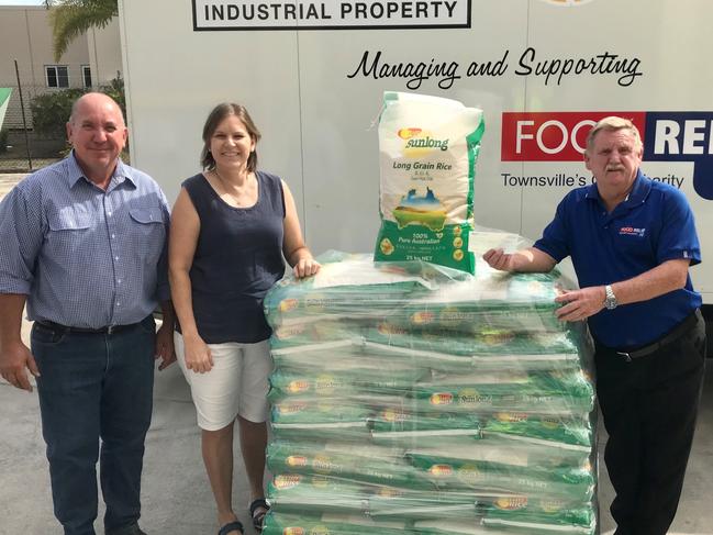 Burdekin rice growers Allan and Lynette Milan drop off approximately 1000 kilograms of donated North Queensland grown rice at Food Relief NQ in Townsville. Also pictured is Food Relief NQ Manager Toby Kelly..