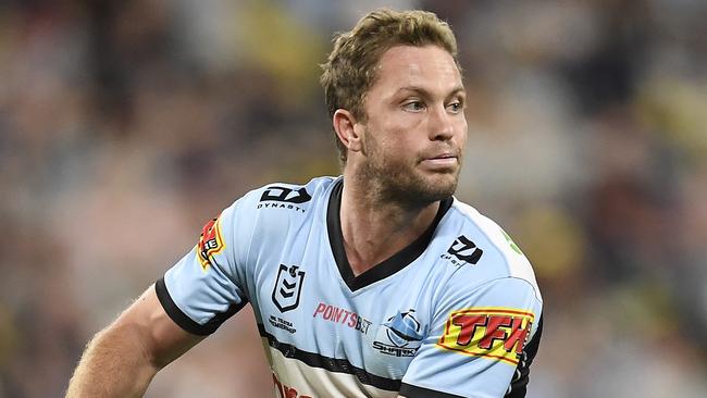 TOWNSVILLE, AUSTRALIA - JUNE 18:  Matt Moylan of the Sharks passes the ball during the round 15 NRL match between the North Queensland Cowboys and the Cronulla Sharks at QCB Stadium, on June 18, 2021, in Townsville, Australia. (Photo by Ian Hitchcock/Getty Images)