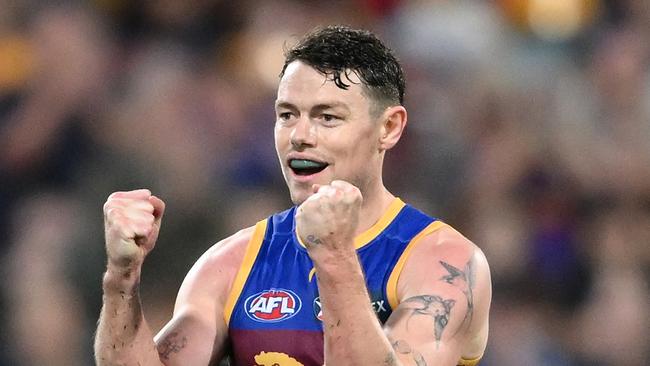 BRISBANE, AUSTRALIA - AUGUST 24: Lachie Neale of the Lions celebrates kicking a goal during the round 24 AFL match between Brisbane Lions and Essendon Bombers at The Gabba, on August 24, 2024, in Brisbane, Australia. (Photo by Matt Roberts/AFL Photos/via Getty Images)