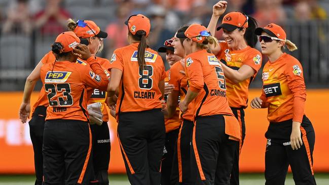 Lilly Mills celebrates taking a catch as the Perth Scorchers roll towards to their first WBBL crown at Optus Stadium. Picture: Getty Images