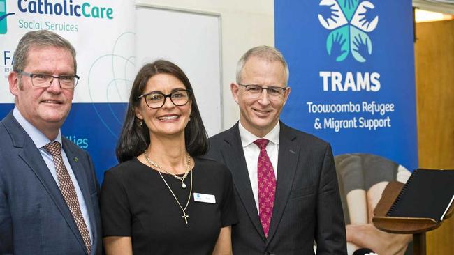 BIG BOOST: Announcing a $400,000 increase to refugee service TRAMS are (from left) Groom MP John McVeigh, CatholicCare director Kate Venables and Families and Social Services Minister Paul Fletcher. Picture: Nev Madsen