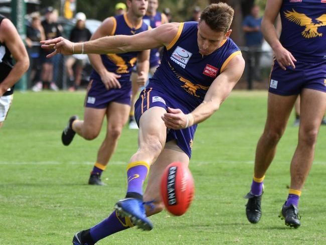 Ryan Mullett gets the ball on his boot. Picture: Field of View Sports Photography