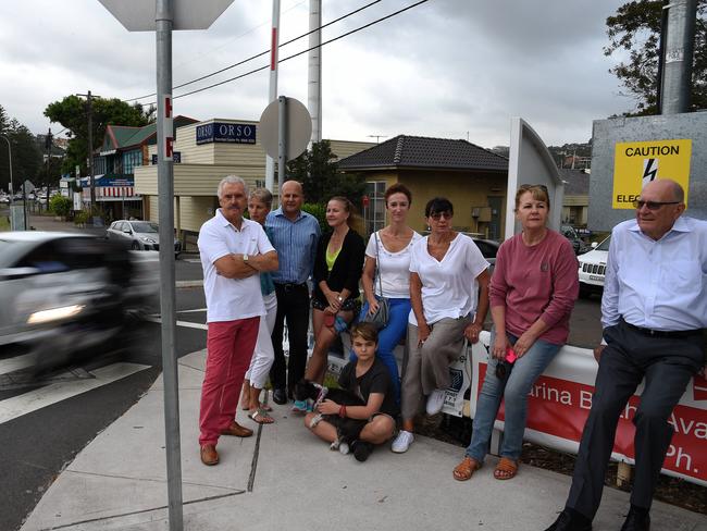 Vehicles race past the boom gate towards Parriwi Rd while residents express frustration at rat runs up their street from the left turn lane, photographed in February 2015. Picture: Annika Enderborg