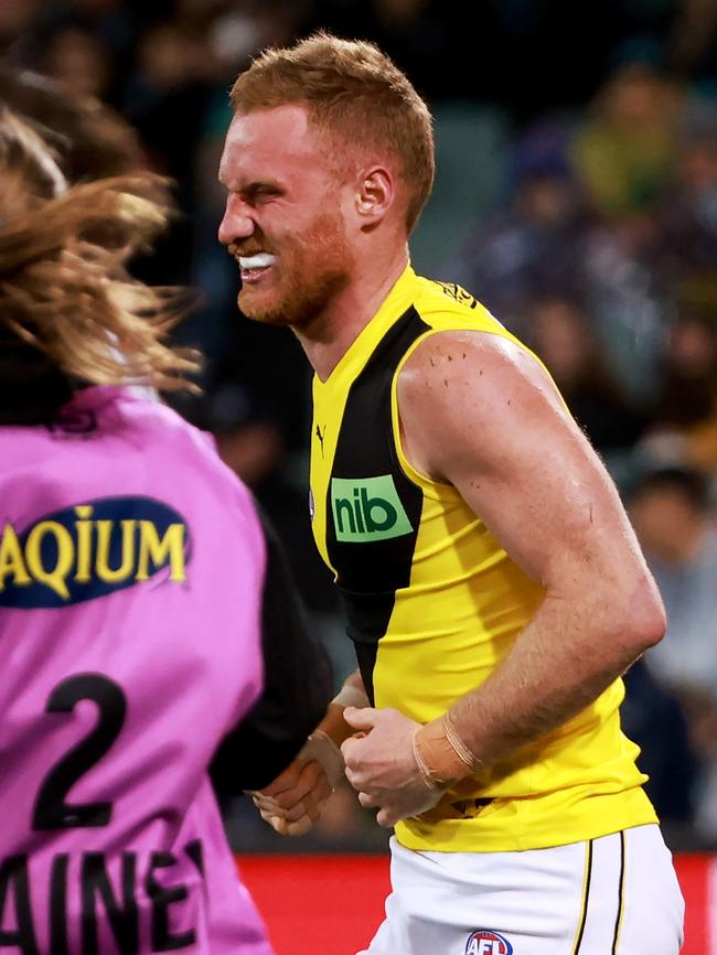 Nick Vlastuin was crunched by Port gorilla Charlie Dixon. Picture: AFL Photos/Getty Images