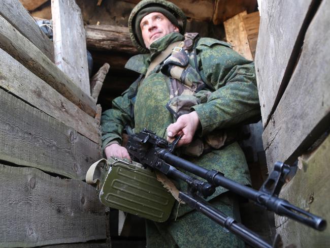 DONETSK REGION, UKRAINE  FEBRUARY 15, 2022: A serviceman of the Donetsk People's Militia stationed on the front line near the rural town of Staromikhailovka, west of Donetsk. Valentin Sprinchak/TASS (Photo by Valentin Sprinchak\\TASS via Getty Images)