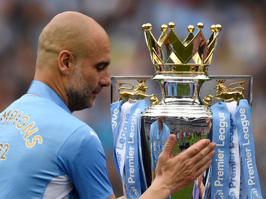 Pep Guardiola was reunited with the Premier League trophy yet again. Picture: Oli Scarff/AFP
