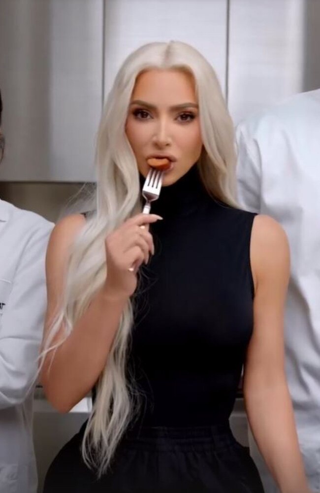 Another clip showed her trying a meatless chicken finger, which was followed by a slice of vegan sausage. Picture: Instagram/KimKardashian