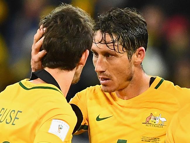 MELBOURNE, AUSTRALIA - SEPTEMBER 05:  Robbie Kruse, Mark Milligan and James Triosi of Australia  react after the whistle during the 2018 FIFA World Cup Qualifier match between the Australian Socceroos and Thailand at AAMI Park on September 5, 2017 in Melbourne, Australia.  (Photo by Quinn Rooney/Getty Images)