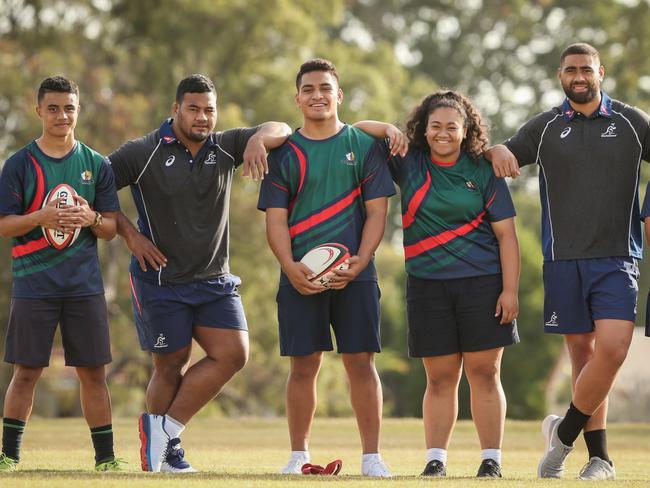 Wallabies Taniela Tupou (second from left) and Lukhan Tui (far right) with Glenala State High School rugby students. Picture: Mark Calleja