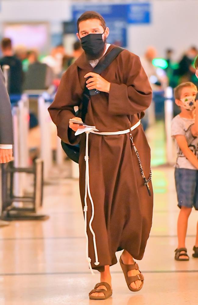 The actor has been seen wearing a monk’s outfit in public, including here at Los Angeles Airport. Picture: Snorlax/MEGA