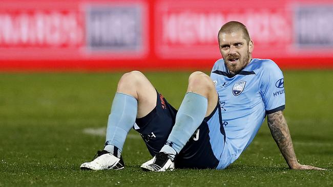 Luke Brattan looks dejected after Sydney FC’s last-gasp defeat. Picture: Getty