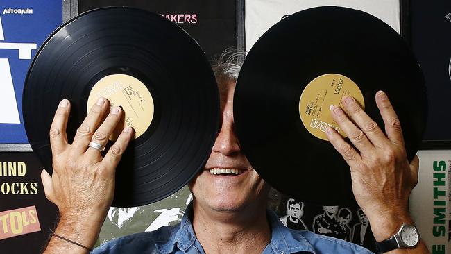 Baz Scott at Egg records in Newtown, with some vinyl getting ready for the Glebe Record fair. Picture: John Appleyard