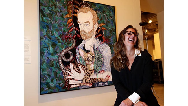 Barton with her 2013 Archibald Prize-winning portrait of Hugo Weaving. Picture: Stephen Cooper.