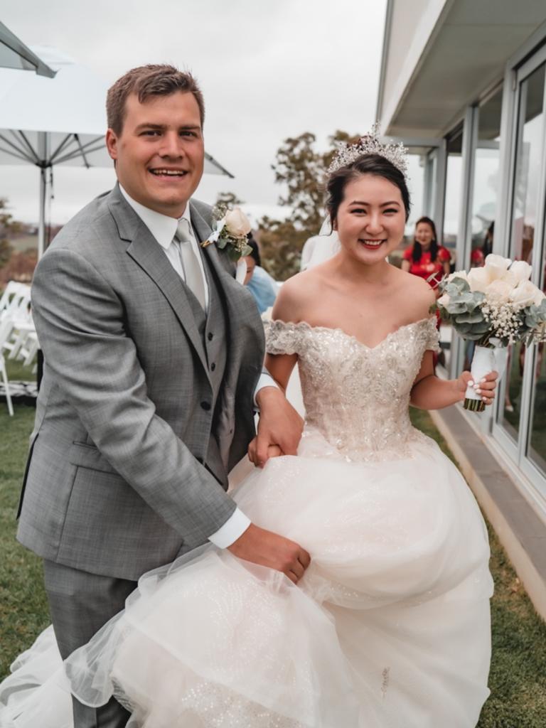 Yanni Pan and Stephen de Bruin, married at ArtWine, Sugacoat It photography. Yanni and Stephen have had more than their fair share of trials and testings preparing for their big day - from the bushfires threatening their ceremony venue, to the coronavirus stopping their best man and two bridesmaids from attending their wedding from China. The missing bridal party tuned into a livestream online.